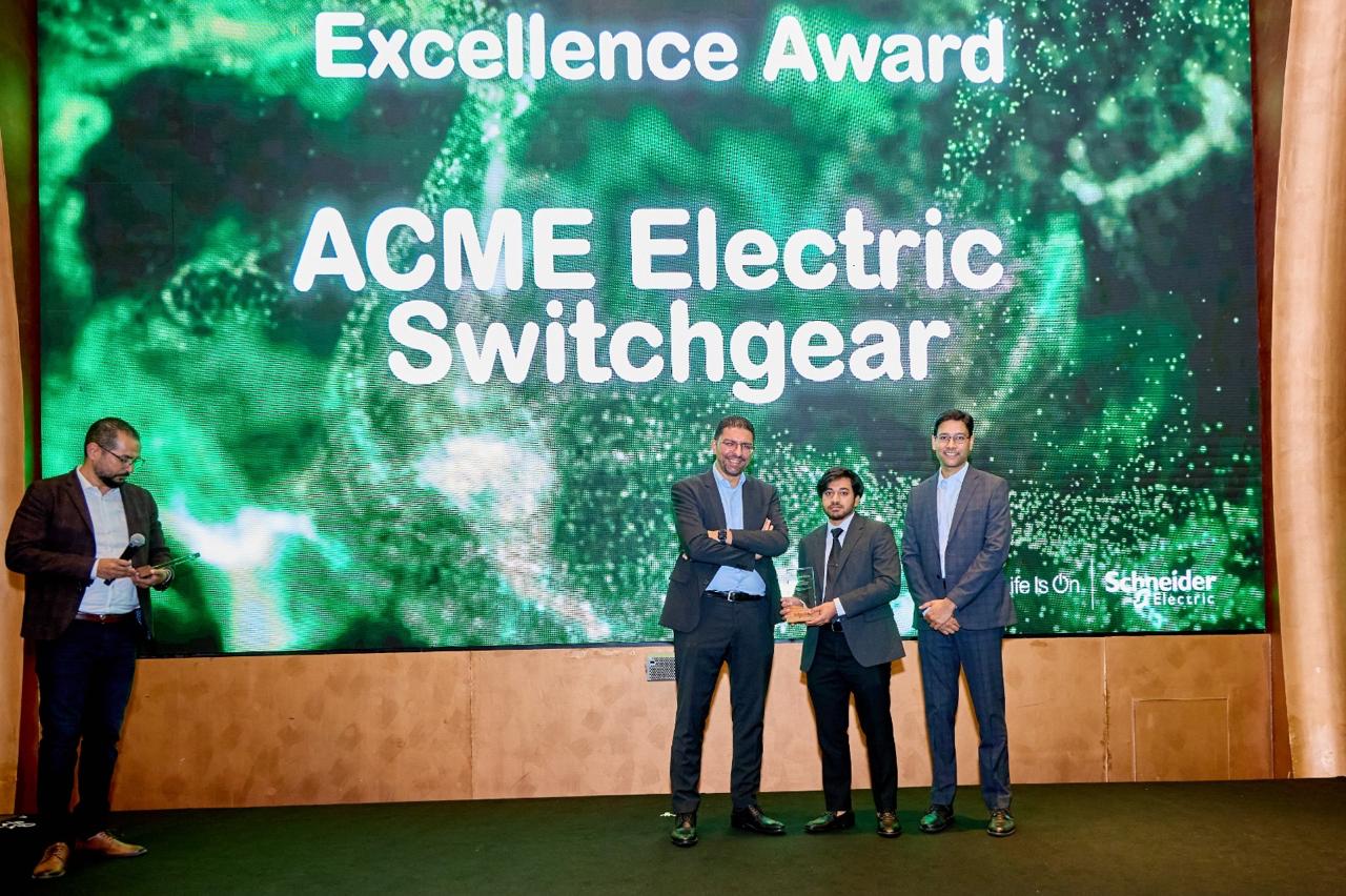 Being awarded the Excellence Award by Schneider